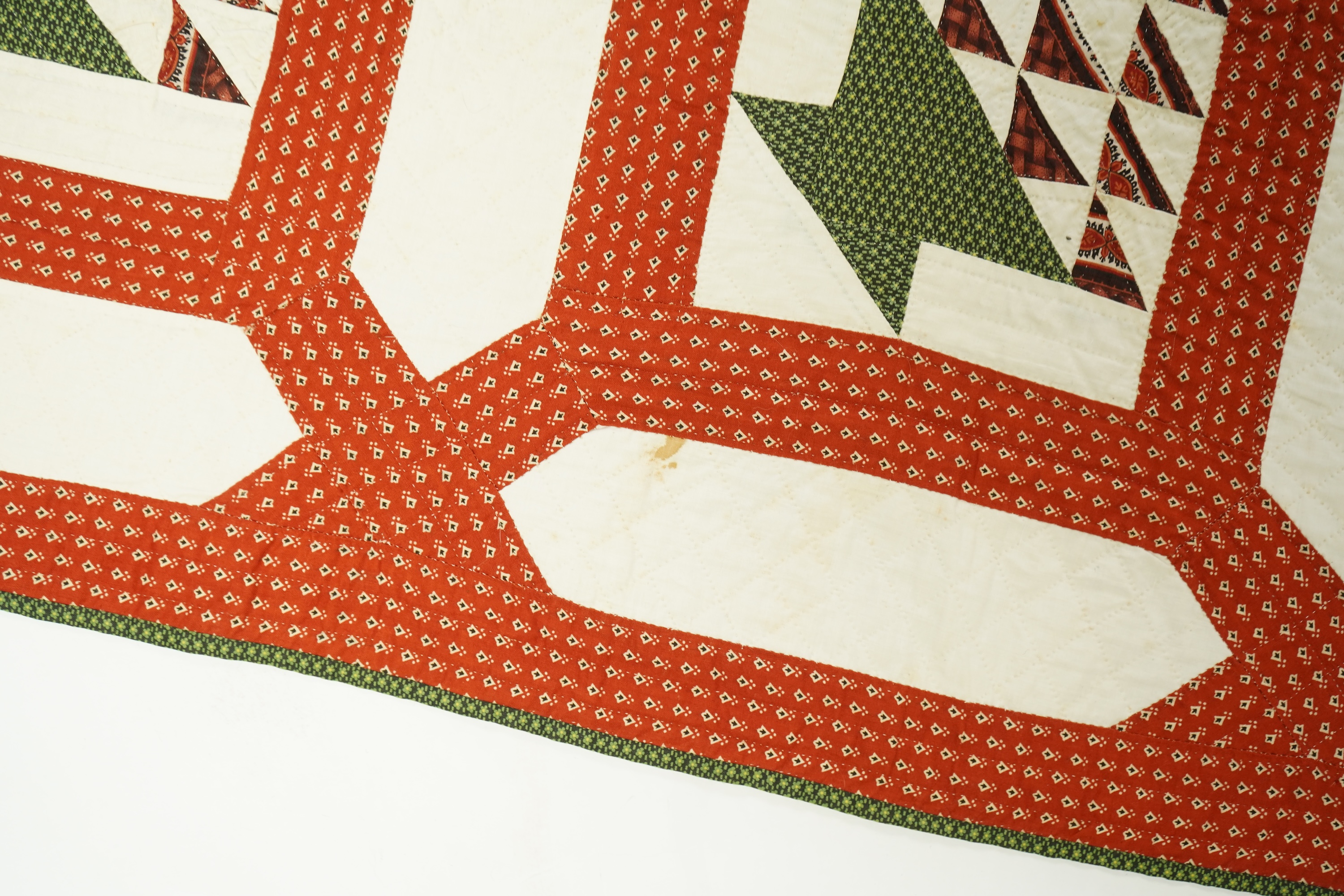 A handsome mid 19th century American ‘Basket’ hand pieced and hand quilted bed cover. An unlaundered Civil War quilt. The reverse side a printed quilted cotton. This quilt purchased in Virginia. 226cm x 168cm. Condition
